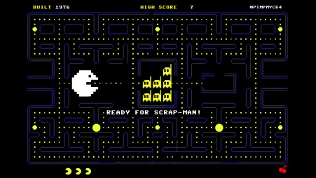  Grafik: Auf der labyrinthartigen, schwarzgrundigen Bedienoberfläche des Videospiels «Pac-Man» erscheint links die Spielfigur in Weiß; in der Zentralkammer des Labyrinths befinden sich sieben gelbe Symbole in Form kleiner Atomkraftwerke. Darunter sticht der Schriftzug «Ready for Scrap-Man» weiß hervor.